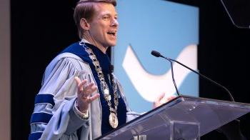 Chancellor Lee H. Roberts giving a speech during his installation on the stage at Memorial Hall on the campus of UNC-Chapel Hill.